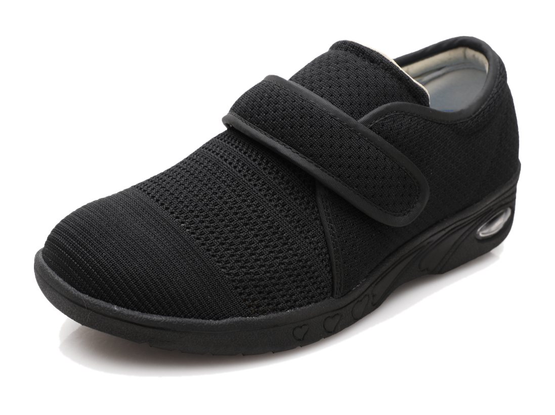 DW-006 Twin-Strap Wide Fit Trainer in Black, three-quarter view showing the closure and the midsole